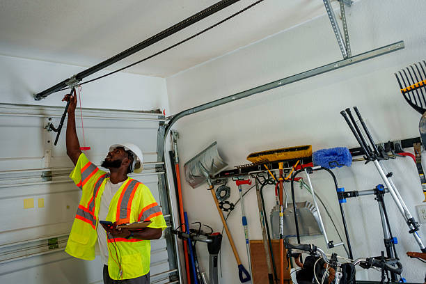 Professional Garage Door Panel Replacement technician working in Tilden, NE